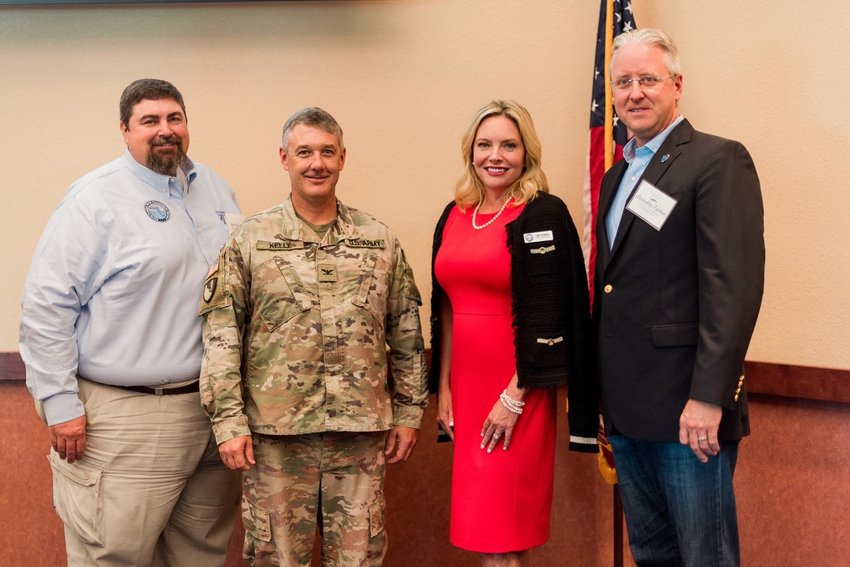 OKEECHOBEE -- Col. Andrew Kelly (second from left) met with lake area representatives on July 28. At left is South Florida Water Management District (SFWMD) Governor Board Member Ben Butler. Third from left is Libby Pigman, of SFWMD. At right is Economic Council Chairman Brandon Tucker.
